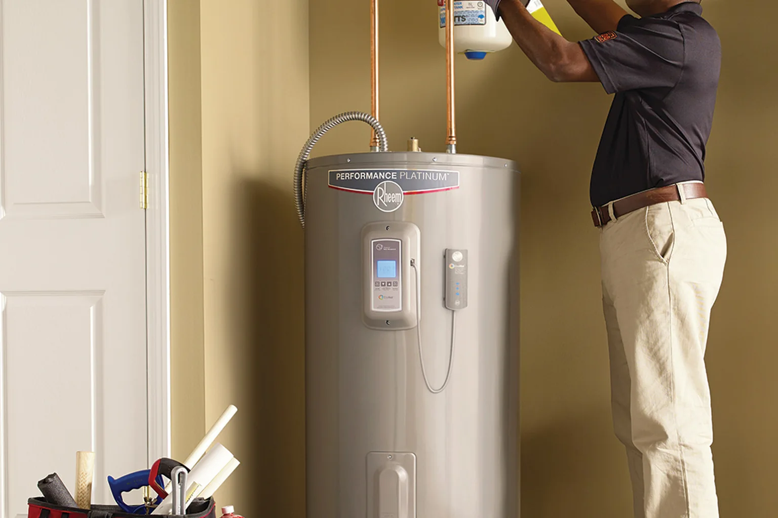 Tank water heater being serviced in a Bloomington, IL home